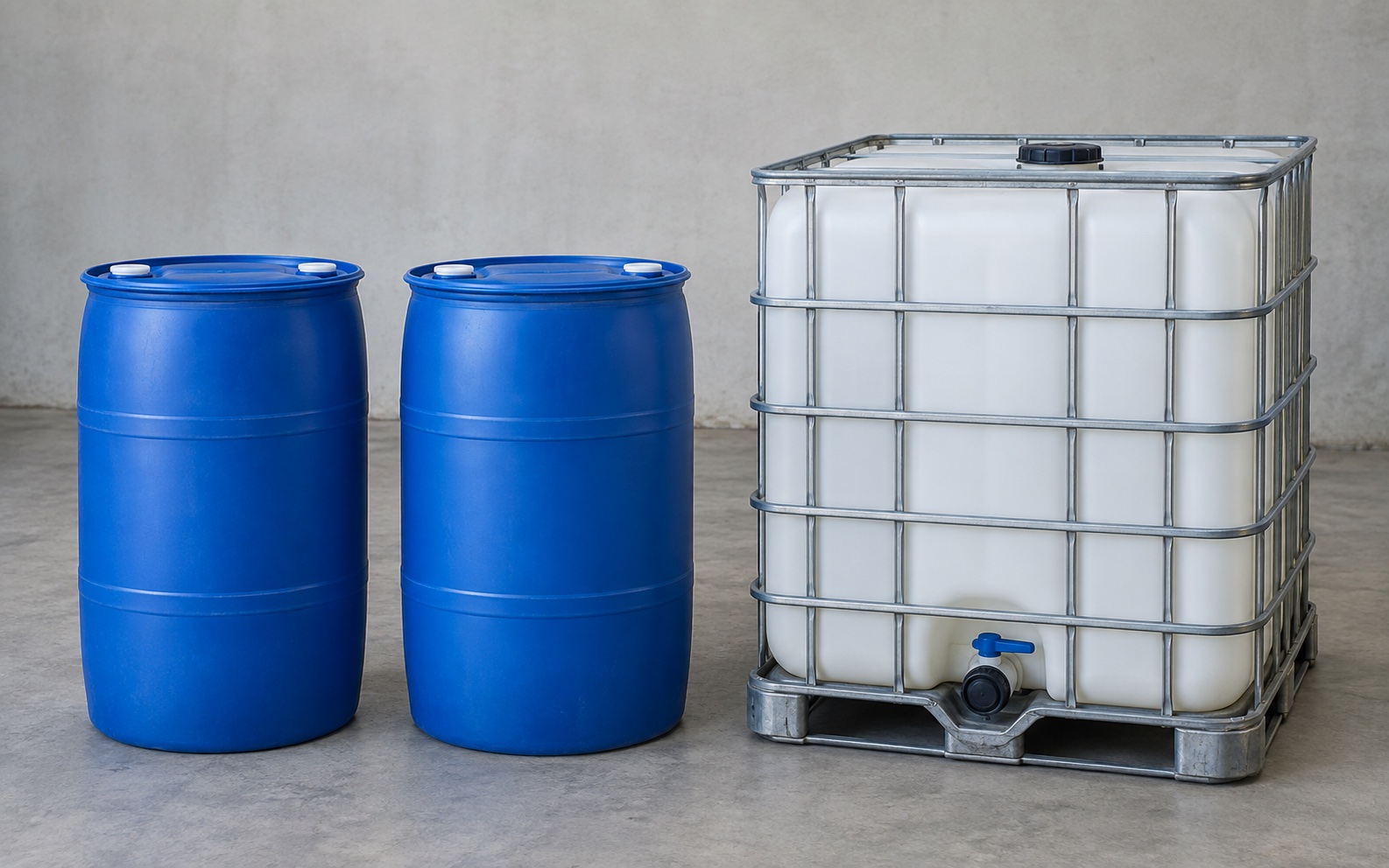 Illustration of two unlabeled blue drums and a white IBC tote against a neutral background.